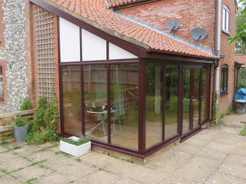 Lean-To Conservatory With A Tiled Roof